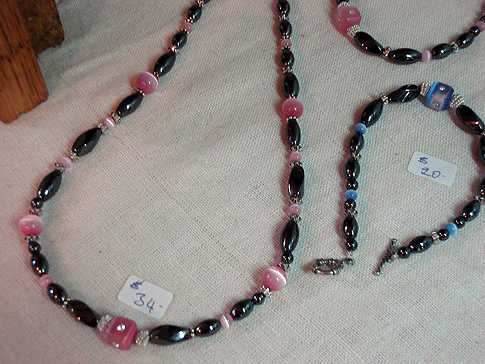 Magnetic Hematite beads in silvery-black with Cats' Eye beads between them. Available in lots of colours. Necklace $34.00 Bracelet $20.00